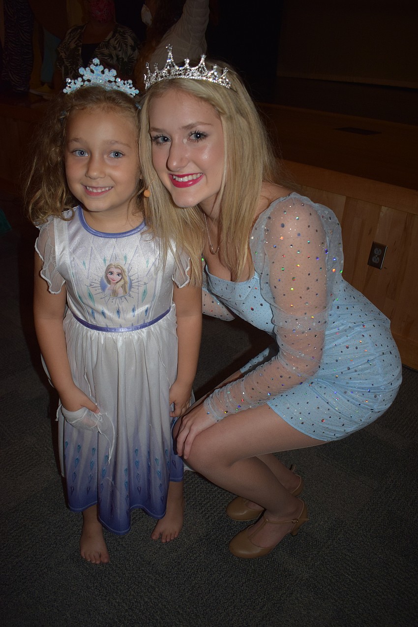 Parrish's Laura Geronimi meets her favorite princess, Elsa, also known as Braden River High School's Lauren Wampler, who sang 