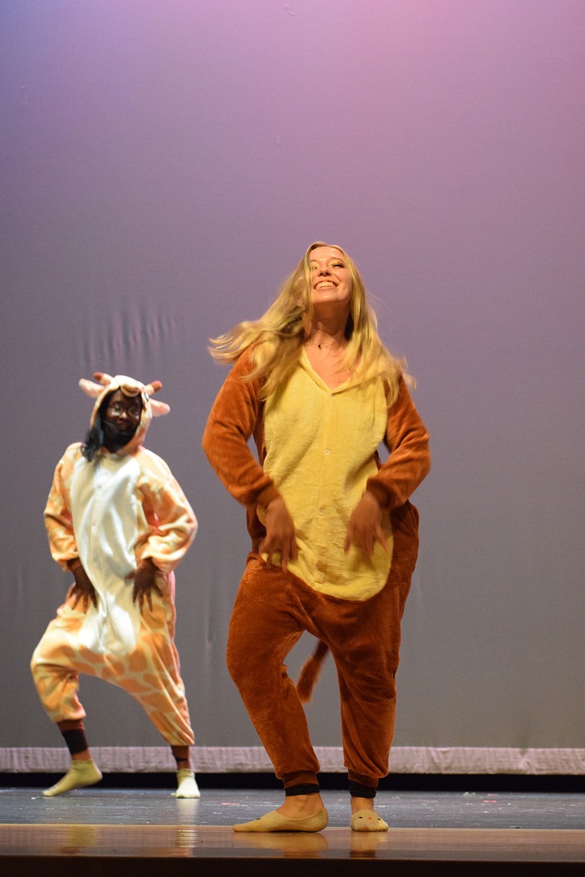 Gabrielle Antoine and Kiera Powers dress in onesies for their 