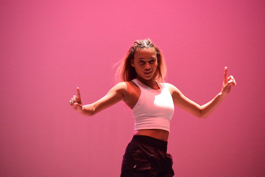 Lola Johnson dances with the Braden River Dance Company during the second ensemble performance. The dance company danced to a remix version of 