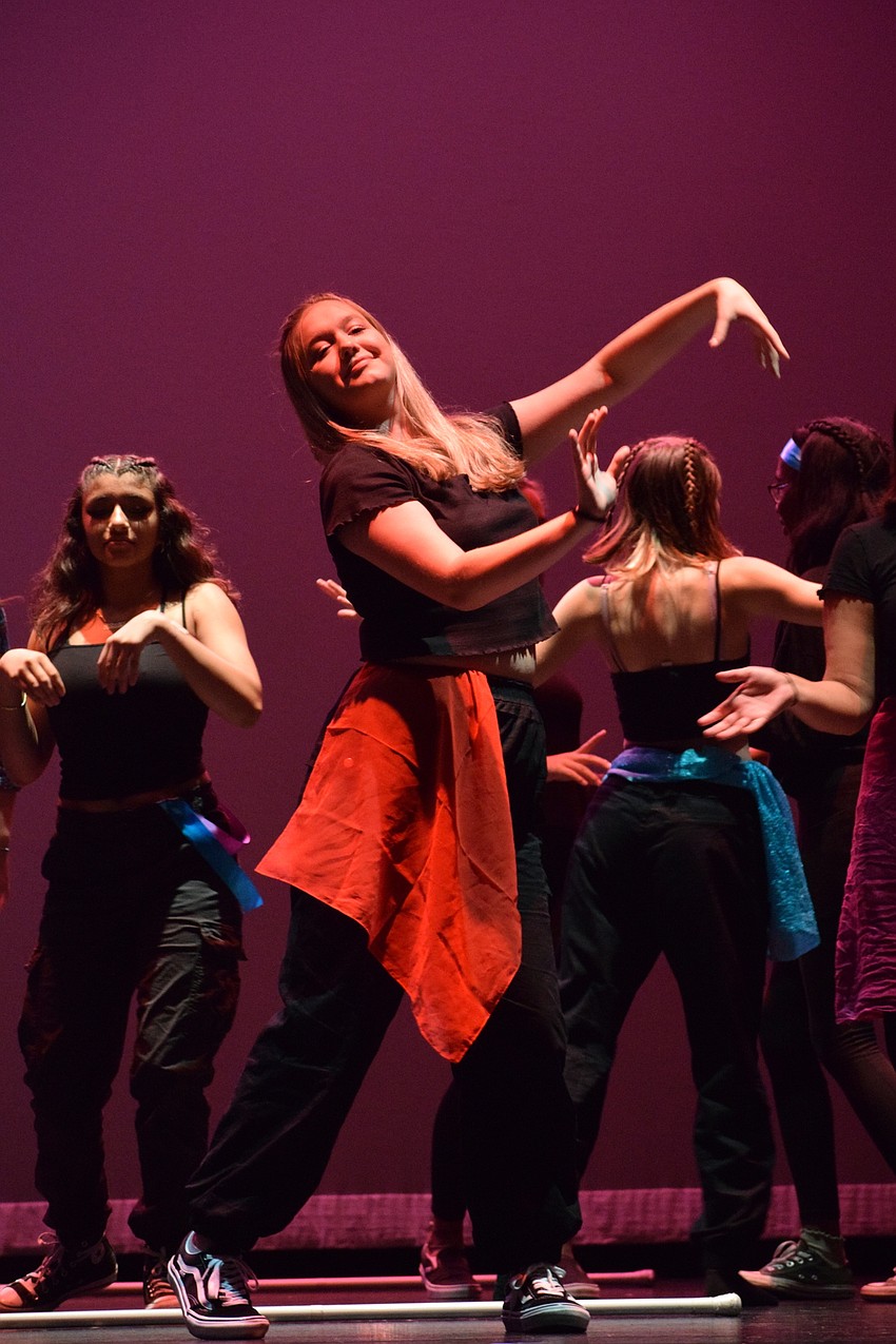 Kimberly Zimmerman dances with the ensemble during a performance of 