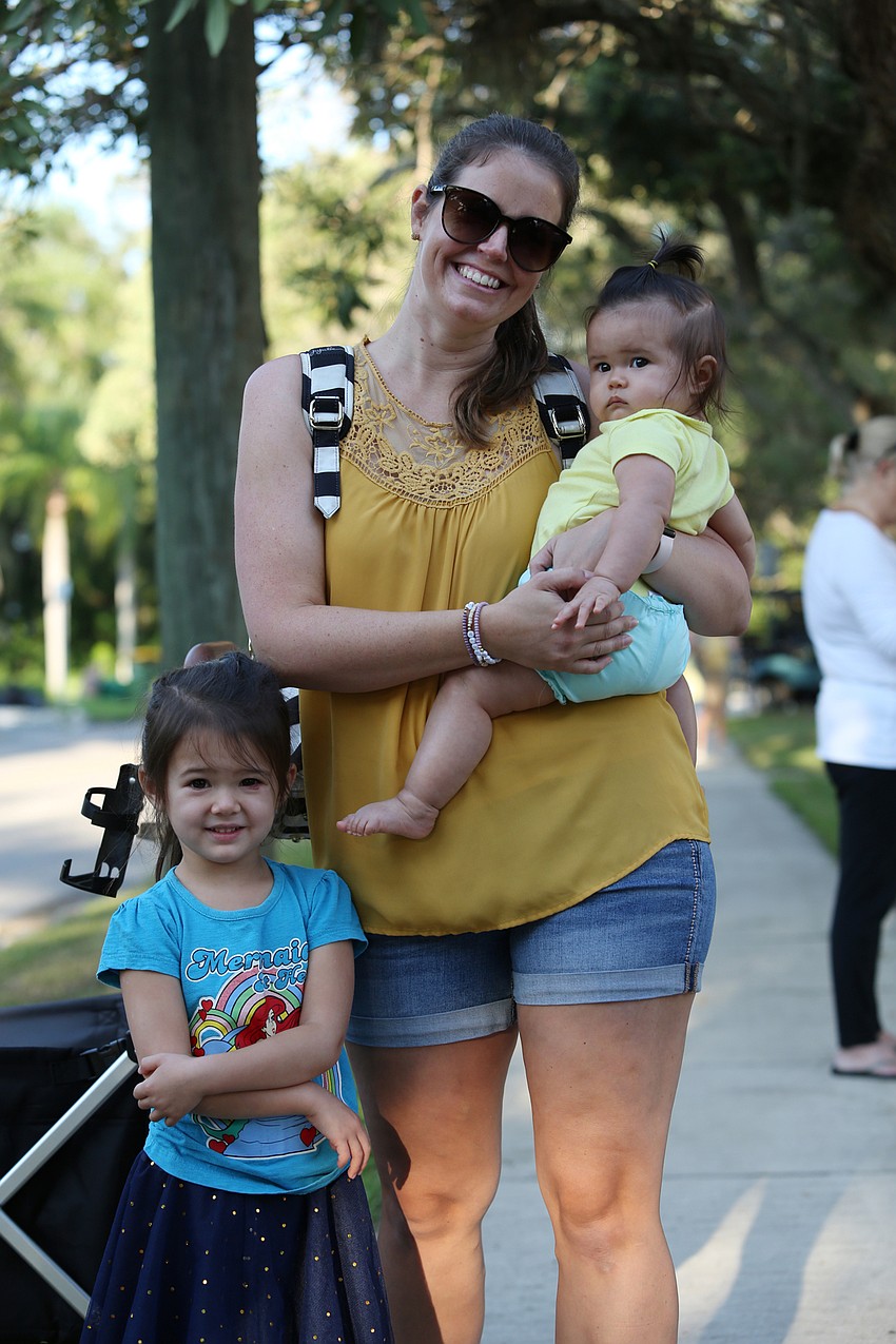 Gwenyth, Alex and Celia Chau waited for the performance to start.