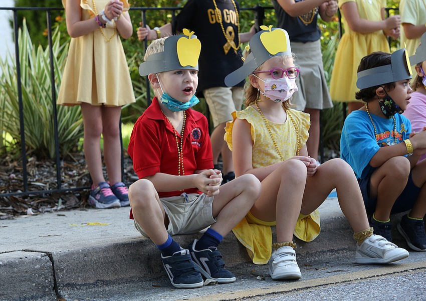 Jason Massey sits at the side.