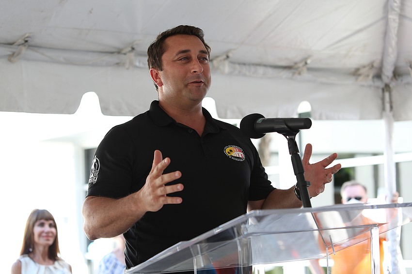 Mayor Hagen Brody emphasizes the importance of dog parks in the city.