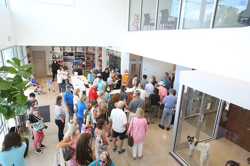 Eventgoers fill into the new facility to.