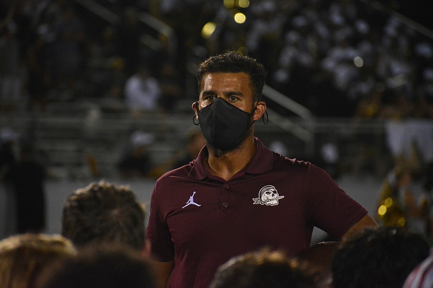 Curt Bradley talks to his team after the win.