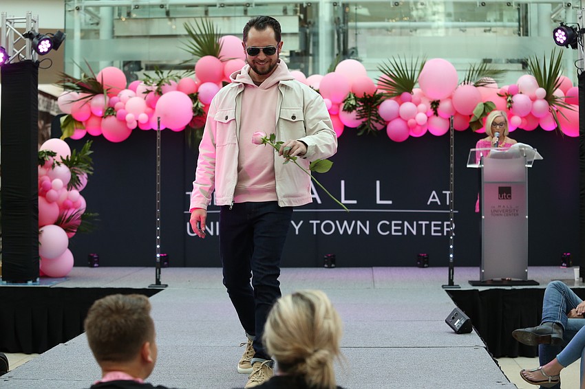 Scott Short hands off his rose.