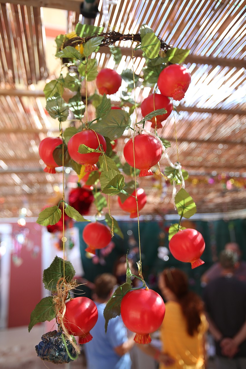 The temple's Sukkah had several gifts and accessories hanging overhead.