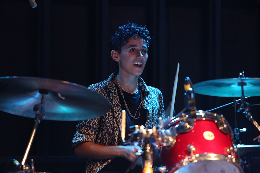 Leah Scarpati keeps on the drums.