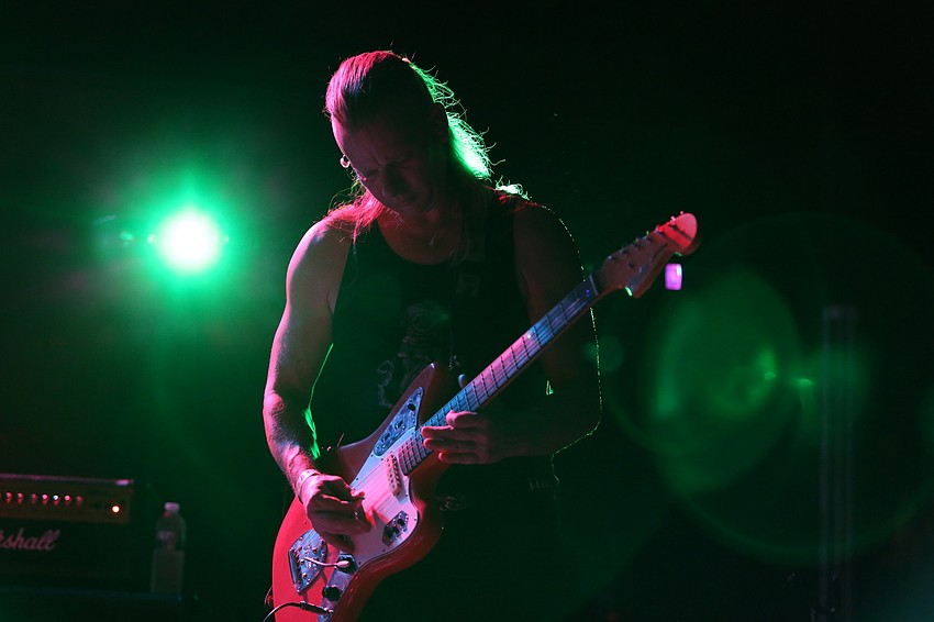 George Bikos plays guitar for MeteorEYES