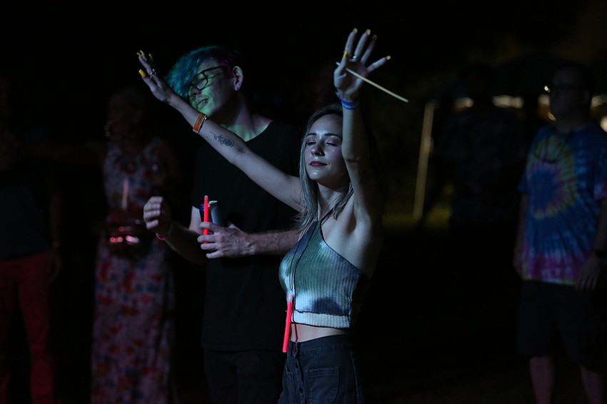 Trevor Post and Janna Sharp dance along.