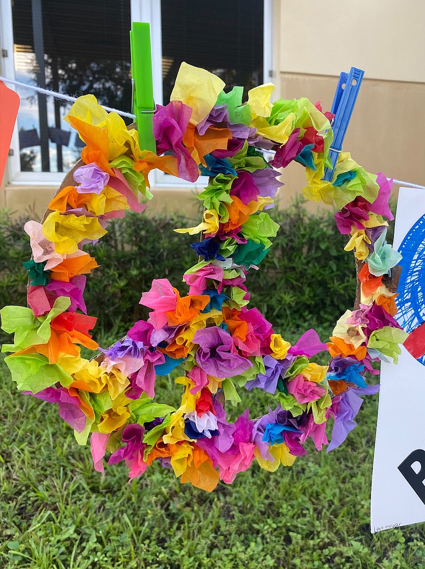 A peace sign is made out of tissue paper. Courtesy photo.