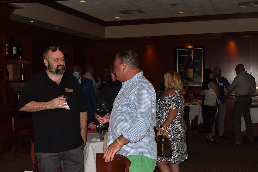 Members mingled before sitting down to hear Chamber updates and win raffle prizes.