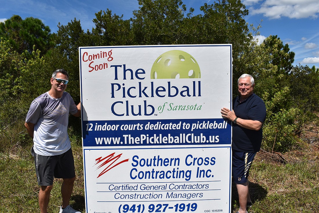 Dominic Catalano (left) and Brian McCarthy stand at the future site of The Pickleball Club, which will feature 12 indoor courts, two outdoor courts, two drill courts and other amenities. Photo by Scott Lockwood