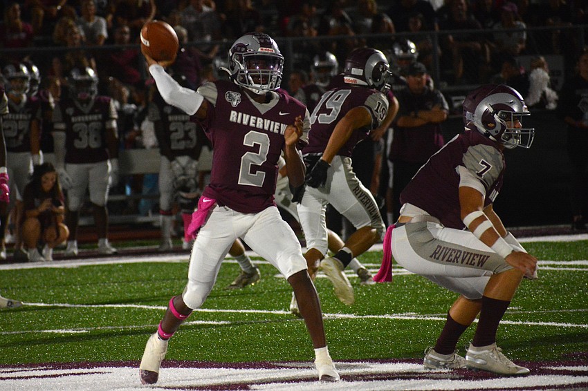 Riverview quarterback Will Carter Jr. fires a pass to his right.