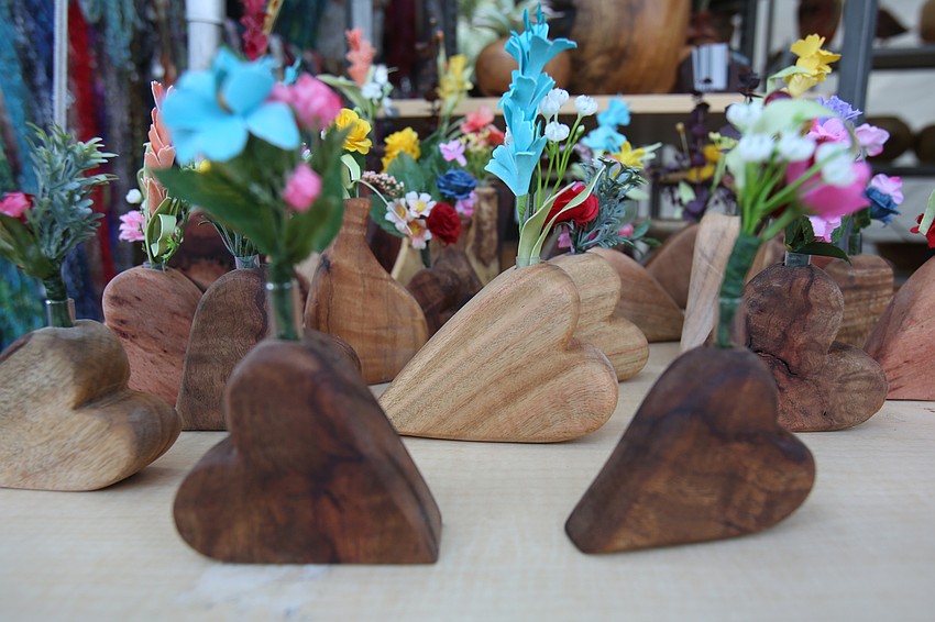 Steven Cohen of Steven's Creative Wood Art sells heart vases