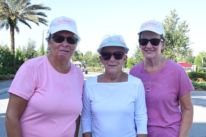 Del Webb Women's Club members Carol Conlin, Judy Loew and Joy Sabol finish their 3.25 walk. They saw an alligator while walking.
