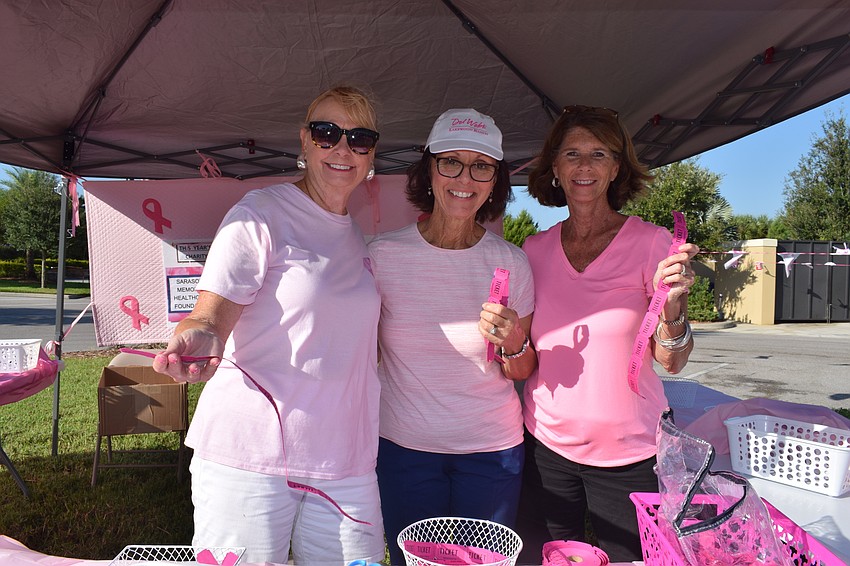 Del Webb Women's Club members Linda Chambers, Dee Truglio and Susan Bauer sell raffle tickets. 