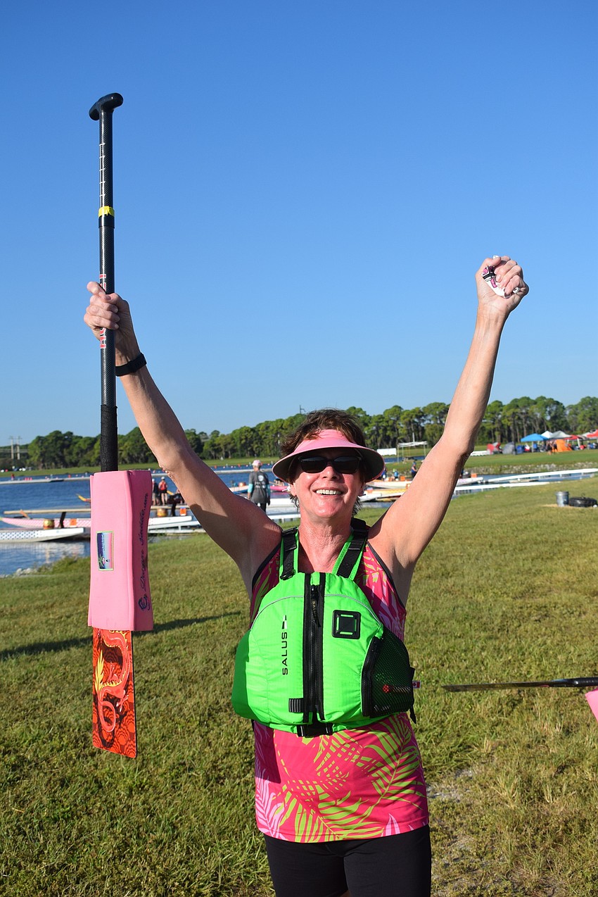 Sarasota's Michele Doss celebrates after Survivors in Sync won a heat on Saturday.