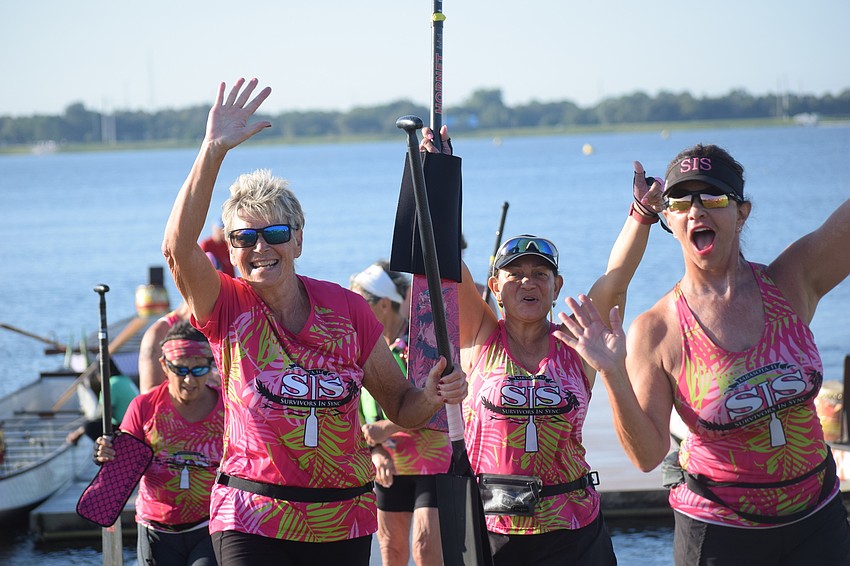 Survivors in Sync's Irene Holt, Veronica Vangas and Carla Baldwin leave the dock after a dominating victory.