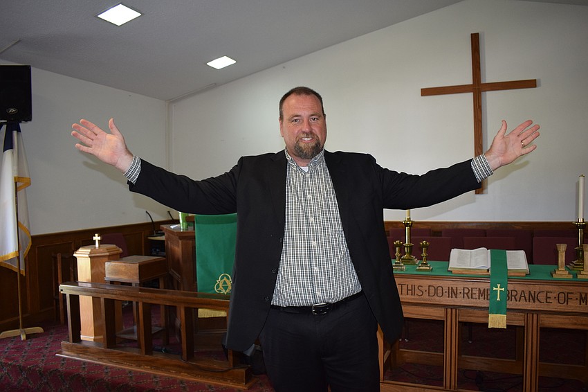 Pastor Mathew Curley sends out his parishioners with a message of love and peace.