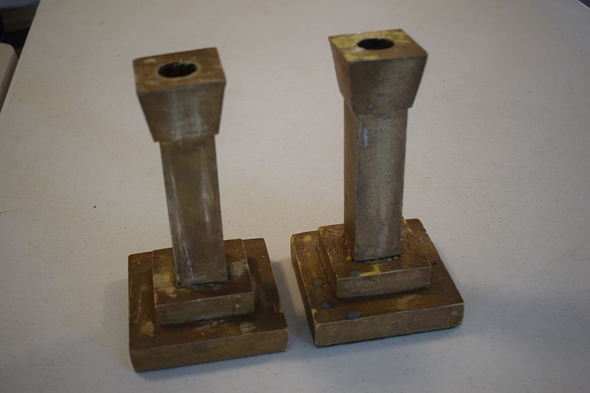 The only item remaining from the old church is a pair of candlesticks.