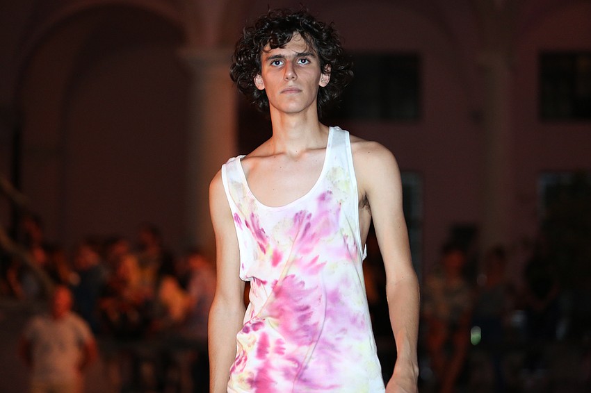 Lauro Garza walked across the courtyard.