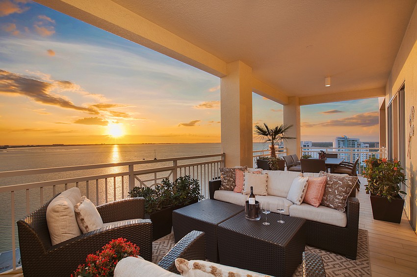 The home offers four terraces overlooking Sarasota Bay and  beyond.