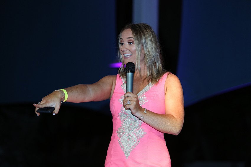 Gillian Hagerty raised money from the audience.