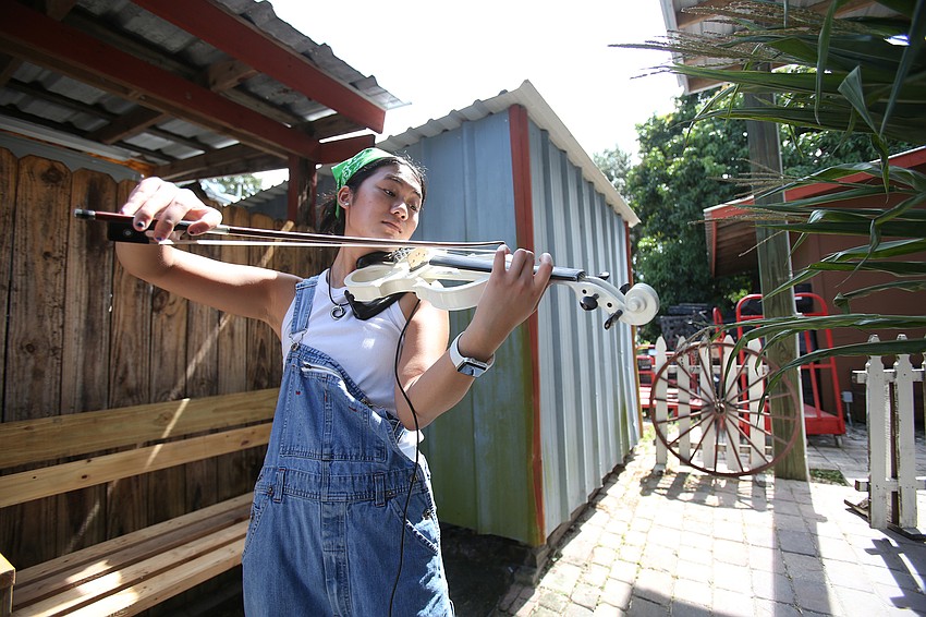 Danae Tran plays violin.