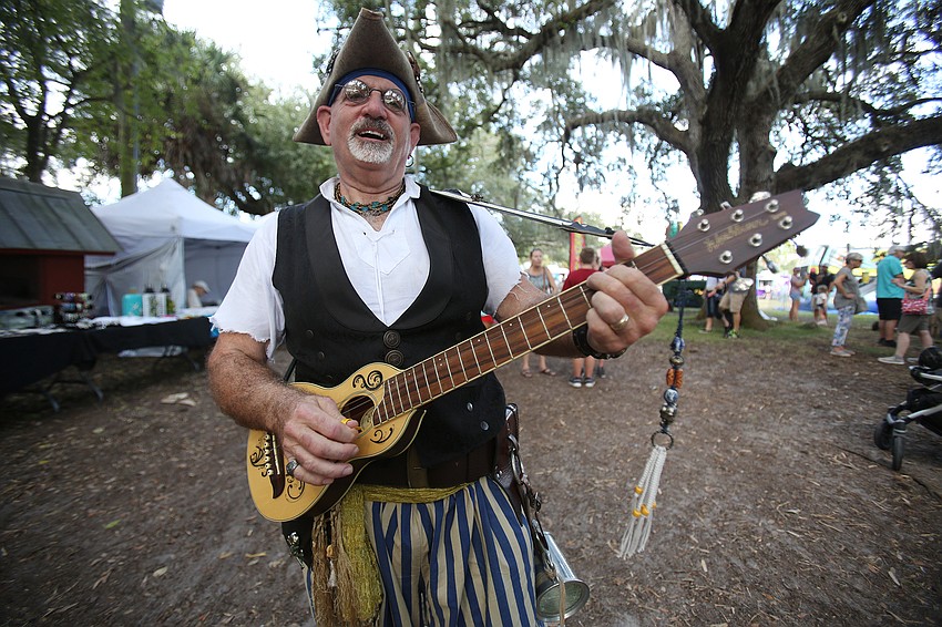 Lawrence Wilhelm plays songs for families.