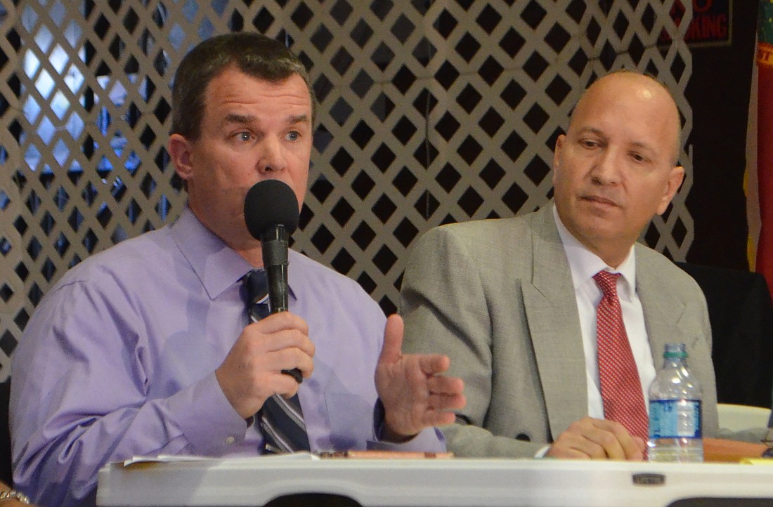 Charlie Kennedy, a member of the School Board of Manatee County, debates Bradenton&#39;s Garin Hoover when the School District of Manatee County&#39;s 1-mill property tax referendum was being voted on in 2018. File photo.