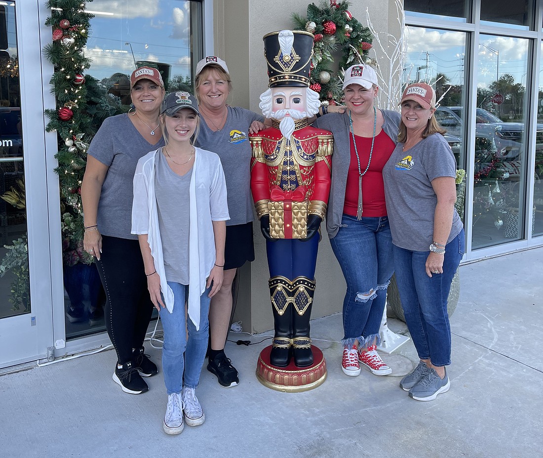 The Haus-Envy staff  have the new store prepared for its first Holiday shopping season. Pictured, from left to right, are Nicole Nuzzo, Savannah Grill, Terry Richards, Mindie Camus and Jodi Rice.