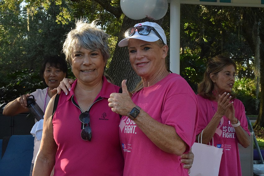 Barbara Somma, who is a co-chair of University Park Country Club's Pink Week, and Sue Marillier, the personal trainer manager, thank everyone for participating in the fitness bootcamp.