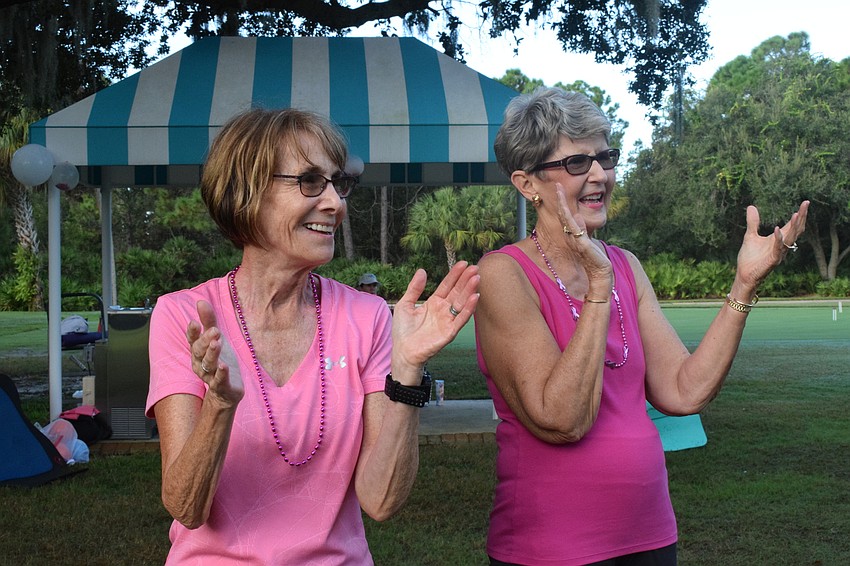 Ellie Pinansky and Dale Otterman cheer for the final three participants in musical squats.