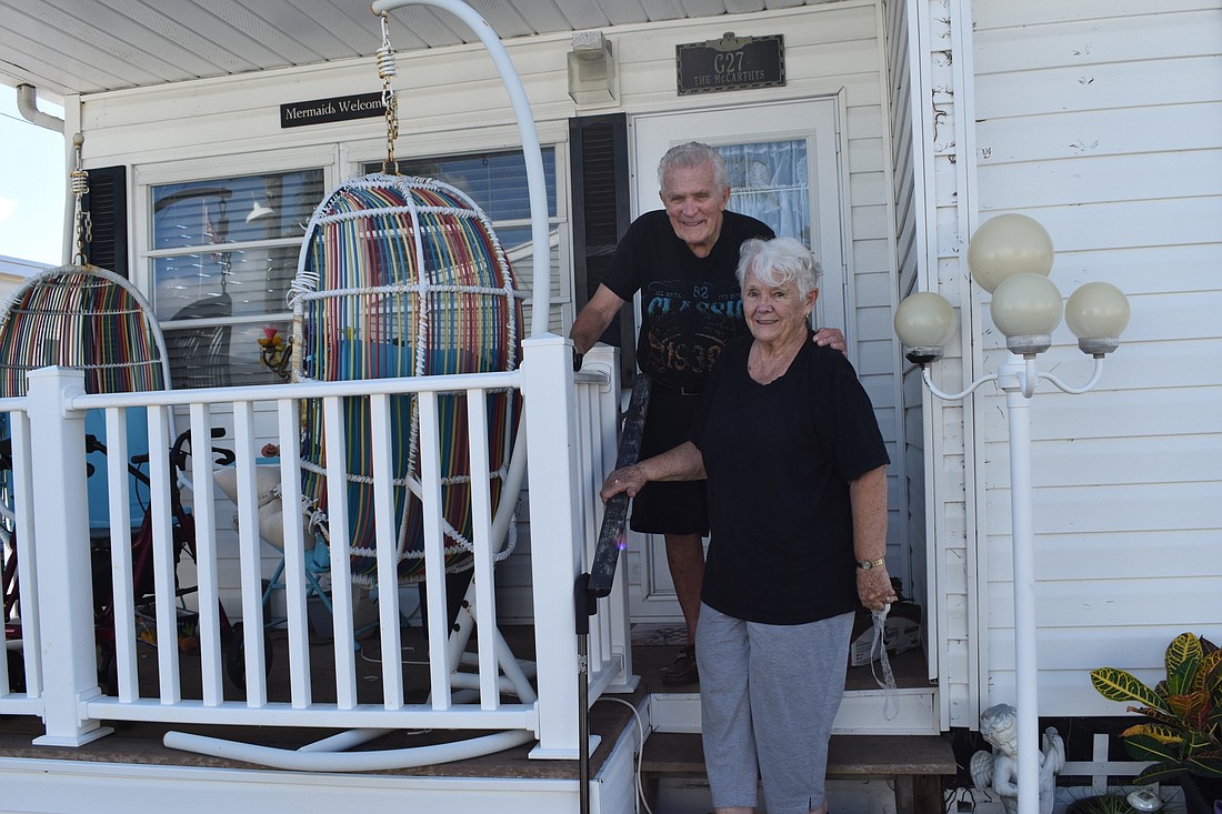 Norma and Tom McCarthy stand outside of their Gulfshore home. The couple has lived in Longboat Key since 2001. They made Gulfshore their full-time residence in 2009.