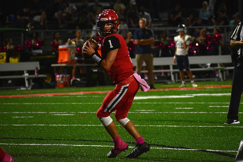 Tayven Clark looks for a receiver downfield.