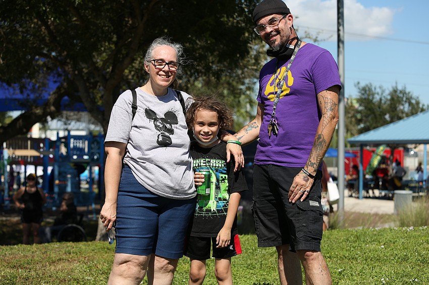 Misla, Kai and Kenny Whetstone listen to the music.