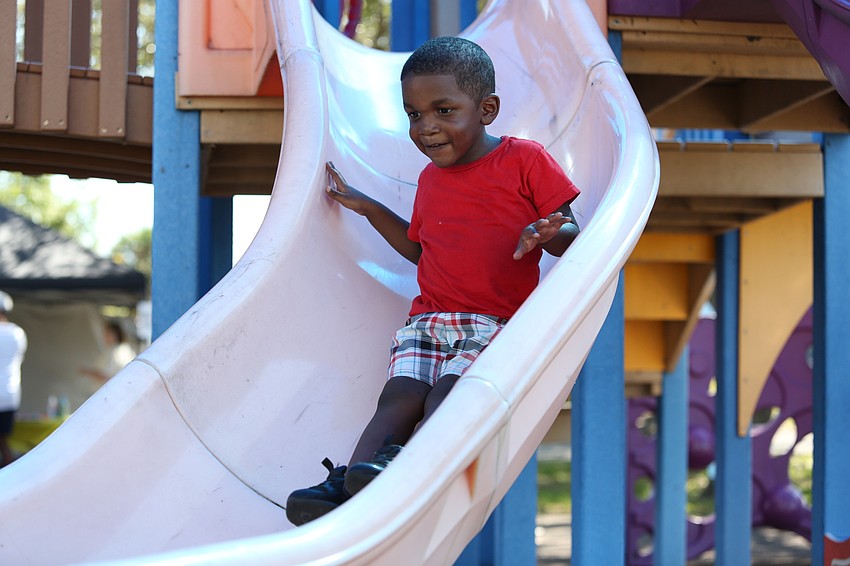 TJ Williams slides down.