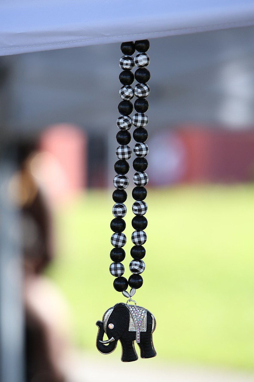 Chip Nelson had necklaces for sale.