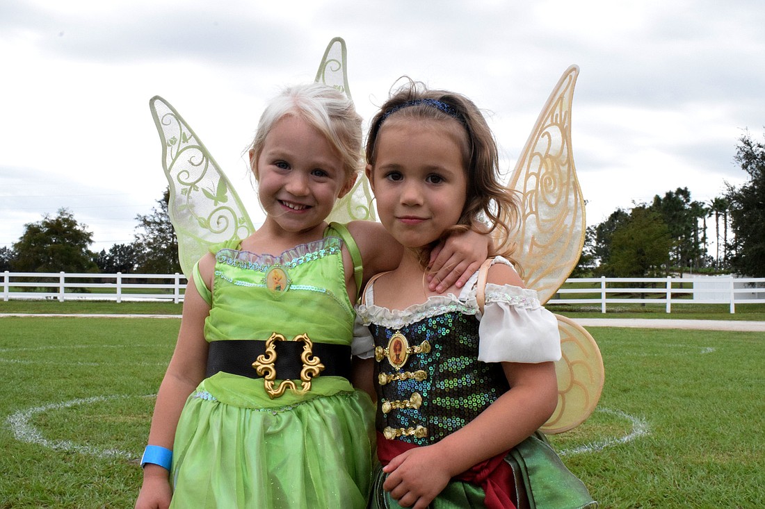 Greenbrook twins Alora and Logan Alt dress as Tinker Bell and Zarina from "The Pirate Fairy" for BooFest. File photo.