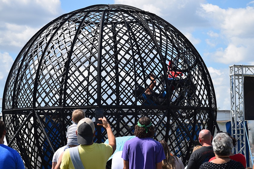 Myakka City's Fearless Flores performs a motorcycle stunt.