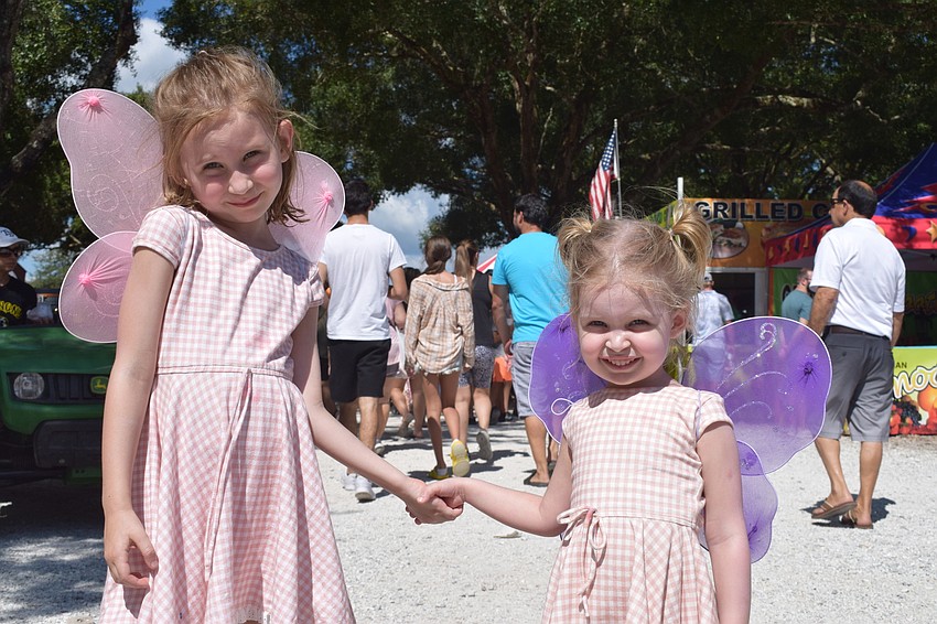 Sarasota's Victoria Gadway, who is 6 years old, dresses as a fairy with her 3-year-old sister, Gabrielle Gadway.