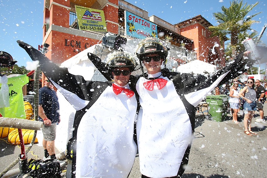 Andrew  Waltrip and Justin Maslonka did up the penguin suits and snow machine for Station 12.