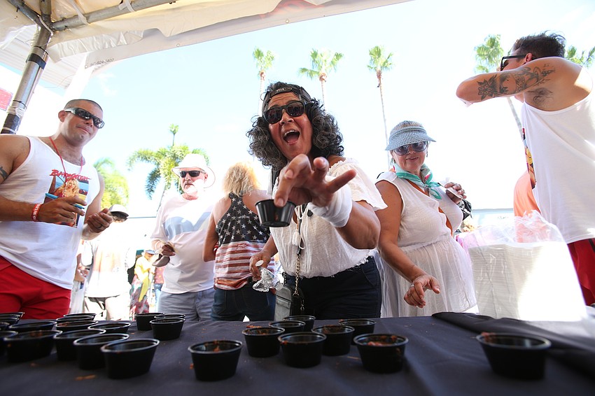 Patricia Arcic picks out her chili.