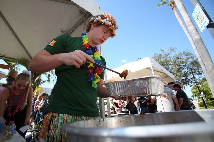 Charlie Tach prepares some chili.