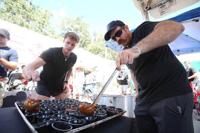 Ronnie Lamb and Dylan Ward with Station 86 work together on their chili.