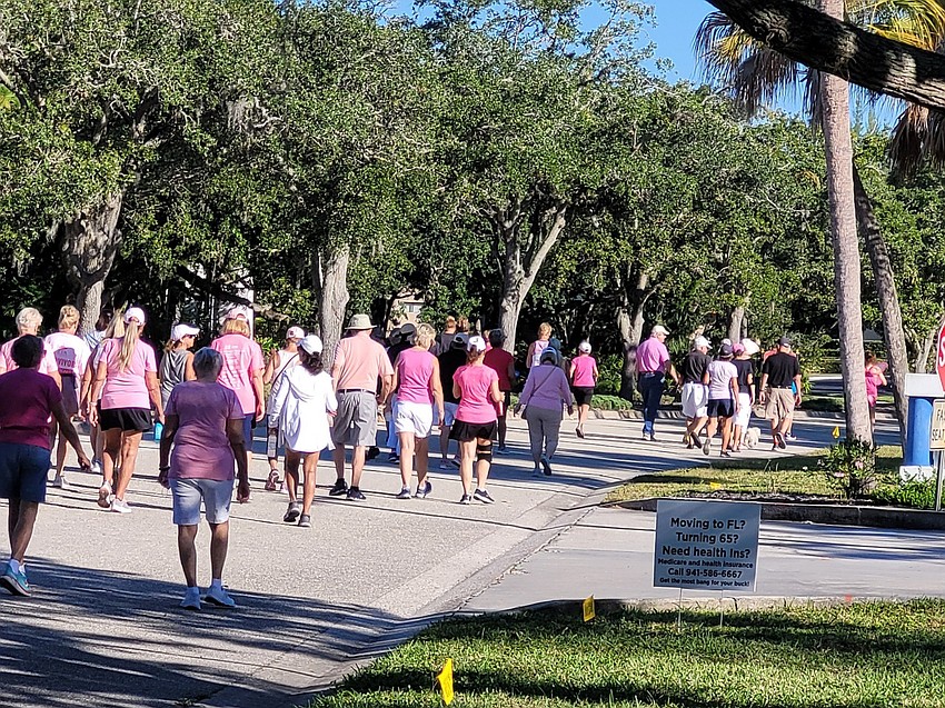 Walkers stride down the 2.7-mile loop. Courtesy photo.