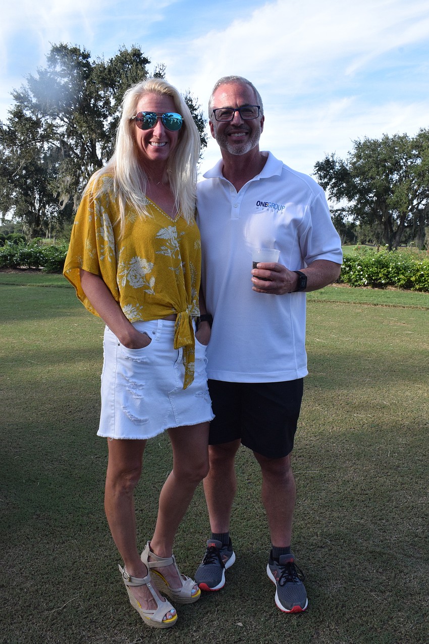 Heritage Harbour's Vicki and Jeff Layhew have fun at Putts for Mutts.