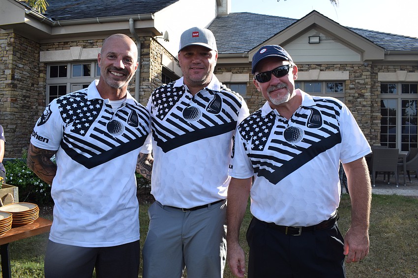 Lakewood Ranch's Jay Glidden, Bill Renick and Raoul Schaput enjoy the reception after a day of golf.