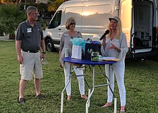 Susan Phillips, right, welcomed sponsors Steve Branham and Kathleen Wingate from Premier Sotheby’s International Realty. Courtesy photo.
